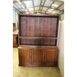 A Victorian oak bookcase cupboard, width 154cm, depth 43cm, height 168cm