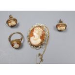 A modern 9ct gold and oval cameo shell set dress ring, a similar brooch and pair of ear studs, gross