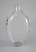 A Georgian glass flattened ovoid flask, 18th century, with milled trailing to each side, lipped