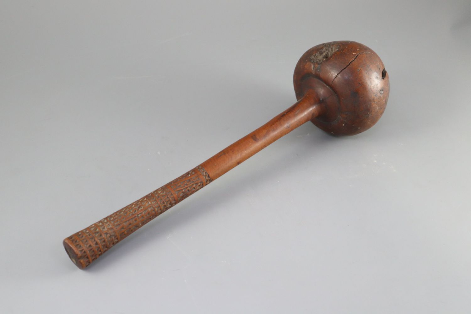 A 19th century Fijian Ula throwing club, with geometric carved handle, length 15.75in. diameter 4. - Image 3 of 5