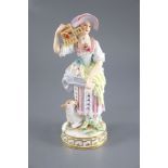 A Meissen figure of a shepherdess releasing a bird from a cage, 19th century, crossed swords mark