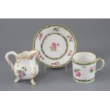 A Sevres cream jug, c.1768, and a Sevres hard paste coffee can and saucer, c.1781, the former