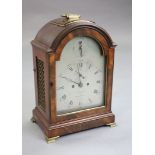 Delasalle of London. A George III mahogany eight day bracket clock, the arched silvered dial with