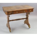 A Regency brass strung rosewood games table, with sliding reversible chess board top enclosing a