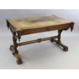 Attributed A.W.N. Pugin, A Victorian oak Gothic revival writing table, with saltire inlaid top,