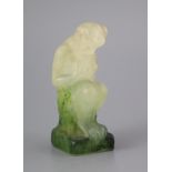 An Amalric Walter pate de verre seated figure of Pan, in green and white frosted glass, signed A.