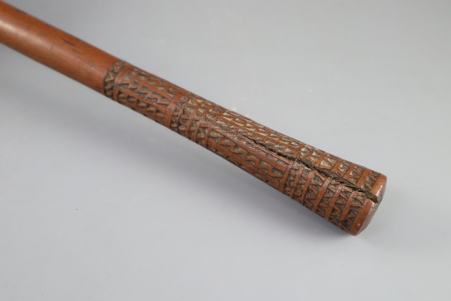 A 19th century Fijian Ula throwing club, with geometric carved handle, length 15.75in. diameter 4. - Image 2 of 5