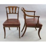 A set of eight Scottish Regency mahogany dining chairs including two carvers, with tablet cresting