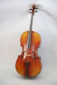 A late 19th/early 20th century German cello, labelled 'Schutz HD junior Marke', with little curl