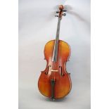A late 19th/early 20th century German cello, labelled 'Schutz HD junior Marke', with little curl