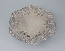 A George VI pierced silver pedestal dish, by Asprey & Co Ltd, with fruiting vine decoration and