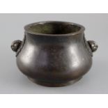 A Chinese bronze baluster censer, Xuande four character mark, but later, cast with a pair of