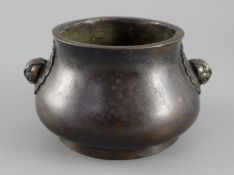 A Chinese bronze baluster censer, Xuande four character mark, but later, cast with a pair of