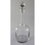 An early Georgian glass decanter, second quarter 18th century, of mallet form the original