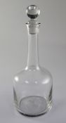 An early Georgian glass decanter, second quarter 18th century, of mallet form the original