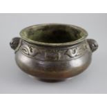 A Chinese bronze gui censer, Xuande mark but later, the compressed ovoid body cast in relief with