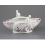 A very fine Worcester two-handled sauceboat, circa 1755-6, the shallow, oval body modelled with