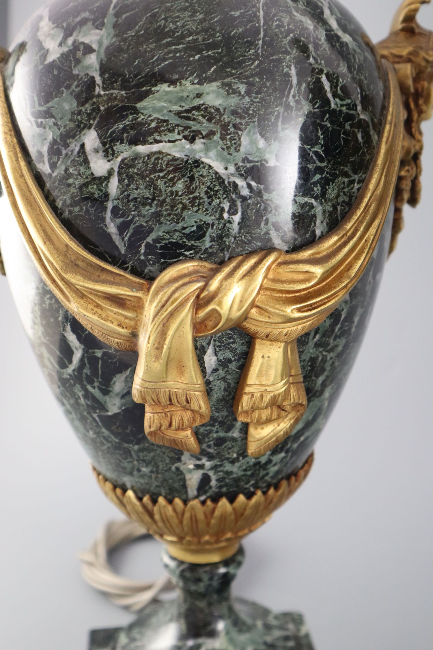 A pair of early 20th century ormolu green marble table lamps, with ovular form with mask lug handles - Image 2 of 6