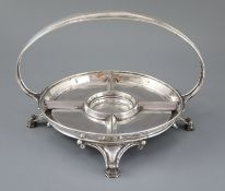 A George V Arts & Craft planished silver hors d'oeuvres circular dish by Ramsden & Carr, with