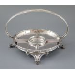 A George V Arts & Craft planished silver hors d'oeuvres circular dish by Ramsden & Carr, with