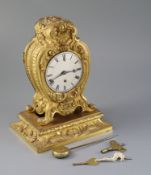 Vuilliamy, London. A 19th century French ormolu mantel timepiece, with heavy cast foliate scroll and