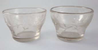 A pair of glass sugar or rinsing bowls, c.1745, of Jacobite significance, of ogee shape, wheel