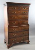 A George III mahogany chest on chest, with dentil cornice, blind fretwork frieze, two short and