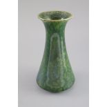 A Ruskin leadless crystalline glaze baluster shape vase, dated 1911, the green mottled glaze with