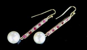 A pair of gold, channel set ruby and diamond drop cultured pearl line earrings, 35mm, gross 4.5