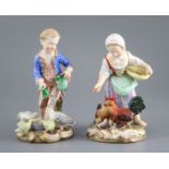 A pair of Meissen figures after the 18th century models of children feeding geese and chickens, 19th