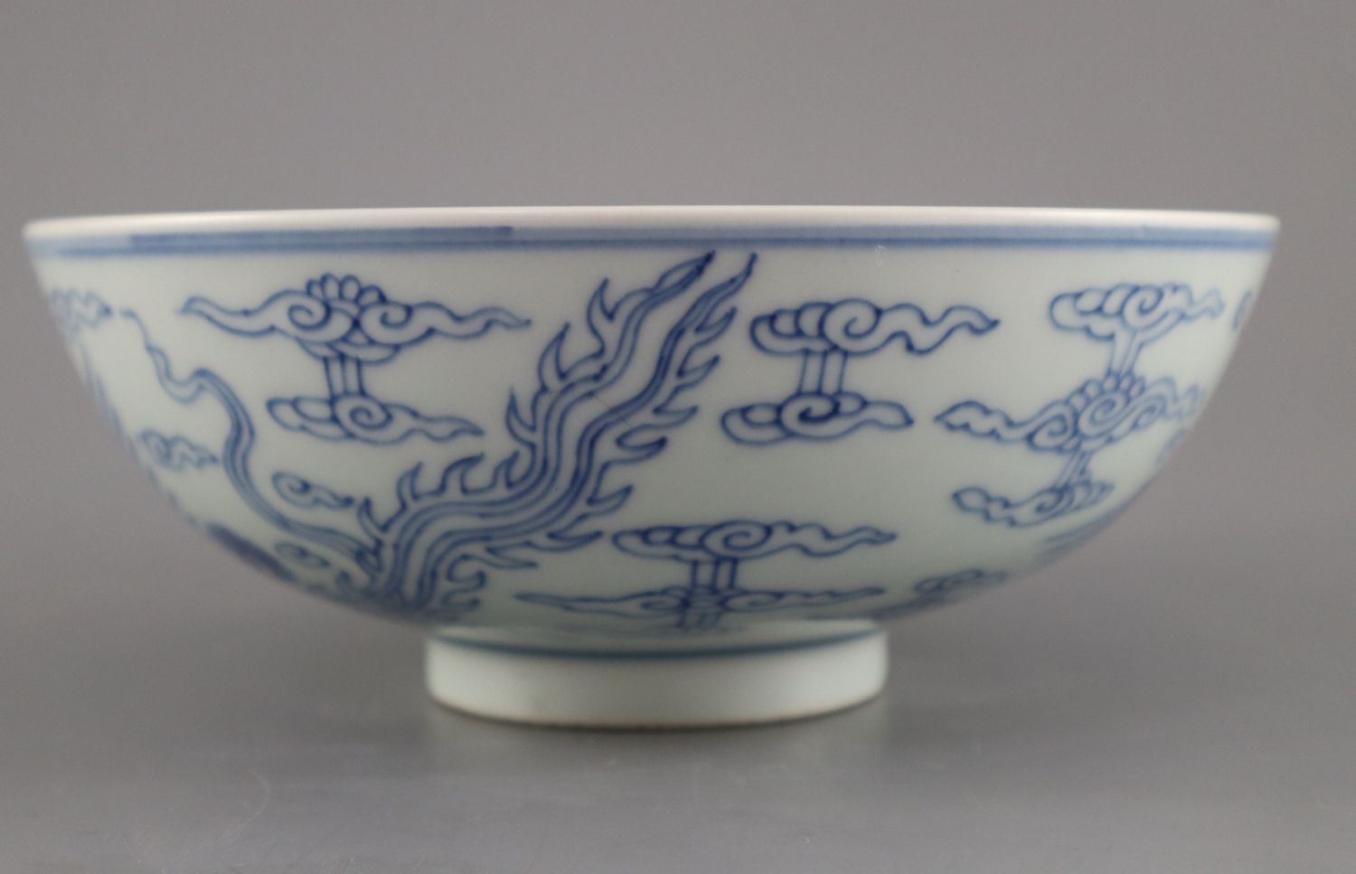 A Chinese blue and white 'double phoenix' bowl, Chenghua mark, possibly 18th century, the phoenix - Image 4 of 4