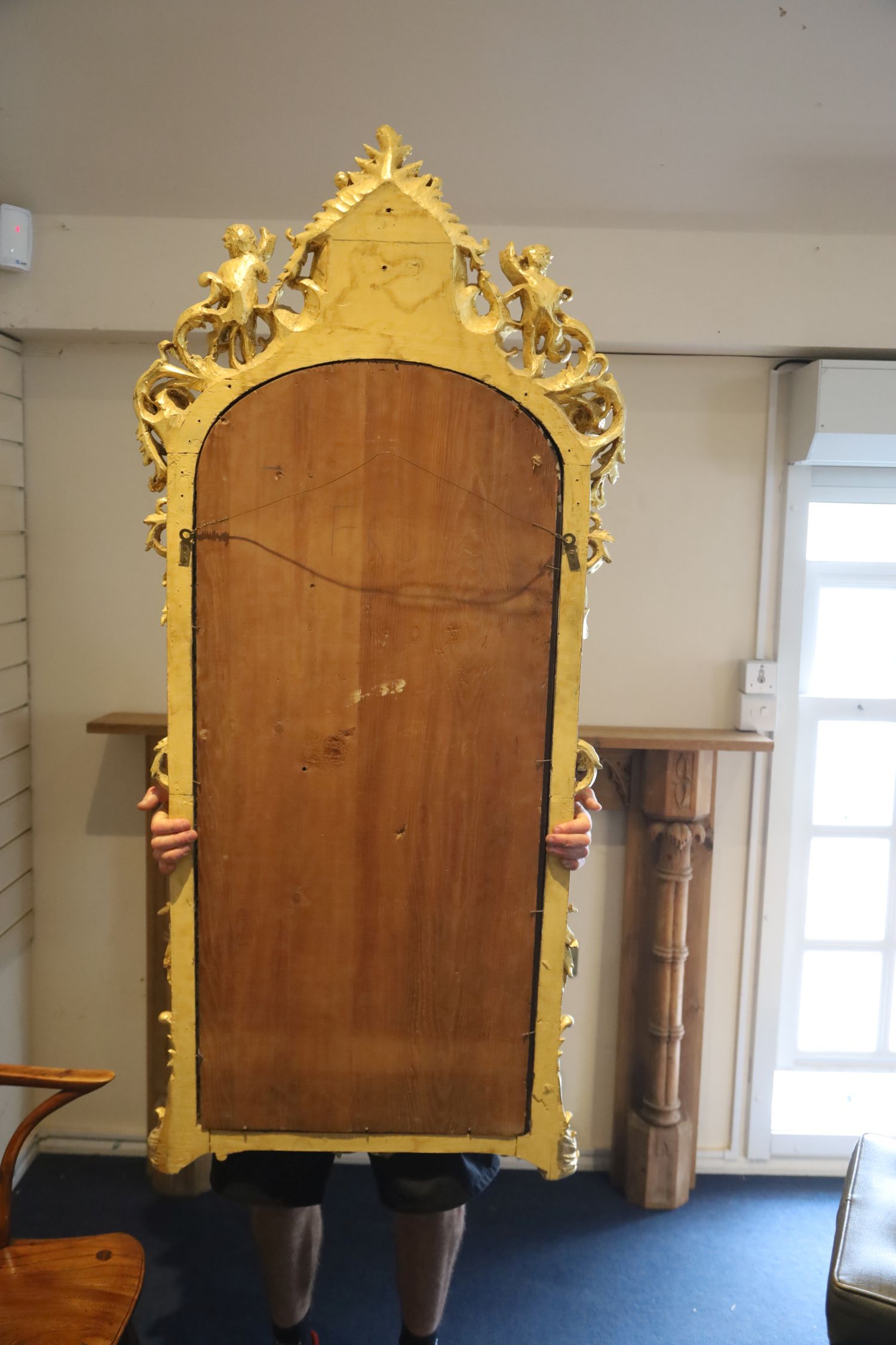 A pair of 19th century French carved giltwood wall mirrors, with scallop and scroll crests flanked - Image 4 of 5