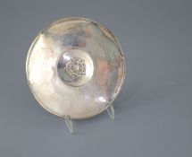 A George V Arts & Crafts Omar Ramsden planished silver Tudor Rose shallow dish, London, 1923, 12.