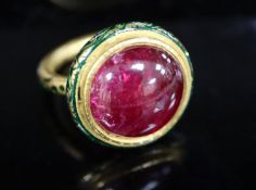 An antique Mogul gold, green enamel and cabochon natural red spinel set ring, with GCS report