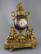 Vernet, Rue du Bac 42. A 19th century French ormolu and bleu du roi porcelain mantel clock, of urn