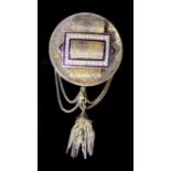 A Victorian gold (tests as 14ct), seed pearl and blue enamel tassel brooch with central buckle motif