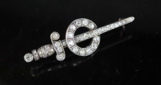 A 19th century gold, silver and diamond set dagger and sphere brooch, set with graduated old round