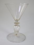 A Dutch wine glass, last quarter 17th century, the conical bowl above a quatrefoil knopped stem with