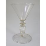 A Dutch wine glass, last quarter 17th century, the conical bowl above a quatrefoil knopped stem with