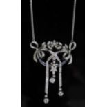An early 20th century platinum, sapphire and diamond set articulated openwork drop pendant necklace,