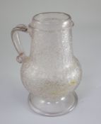 A Continental ice glass flagon, c.1600, possibly Antwerp, of baluster form, with plain applied