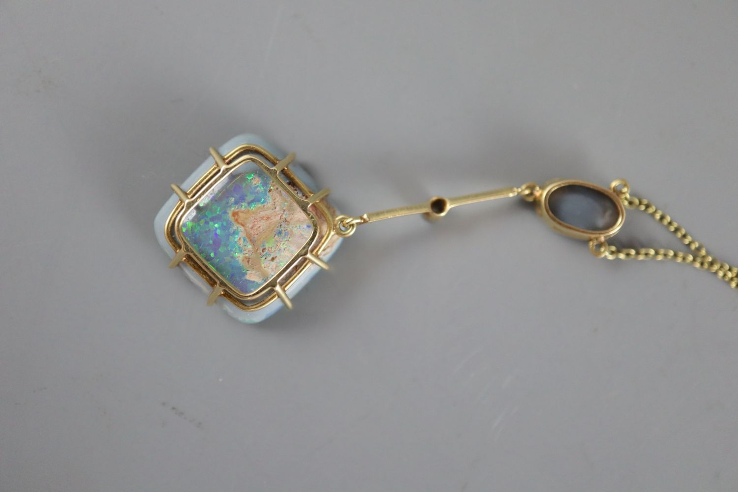 An early 20th century 15ct gold, diamond and two stone opal set drop pendant necklace, pendant 50mm, - Image 4 of 5