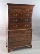 A George III mahogany chest on chest, fitted two short and six graduated long drawers with a central