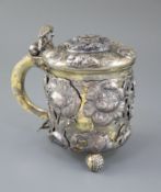 A late 18th/early 19th century Norwegian parcel gilt silver peg tankard, with applied and embossed