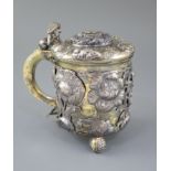 A late 18th/early 19th century Norwegian parcel gilt silver peg tankard, with applied and embossed