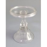 An unusual George II miniature glass tazza, second quarter 18th century, the dish top above a