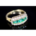 A late Victorian gold, graduated five stone emerald and diamond cluster half hoop ring, size K,