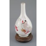 A Chinese famille rose bottle vase, Daoguang period (1821-50), finely painted with two figures