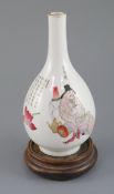 A Chinese famille rose bottle vase, Daoguang period (1821-50), finely painted with two figures