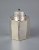 A George V Liberty & Co silver and nine stone cabochon garnet set octagonal tea caddy and cover,